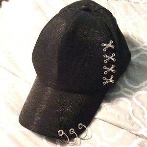 Black cap with silver rings